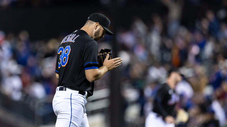 Tylor Megill of the New York Mets reacts at the third inning of the game against the Philadelphia Phillies at Citi Field.