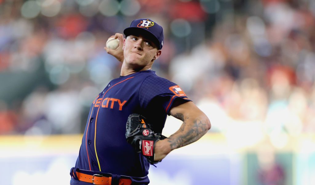 Hunter Brown of the Houston Astros delivers during the first inning against the Texas Rangers at Minute Maid Park.