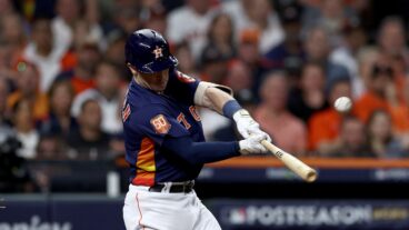 Alex Bregman of the Houston Astros hits a three-run home run against the New York Yankees during the third inning in game two of the American League Championship Series at Minute Maid Park on October 20, 2022 in Houston, Texas.