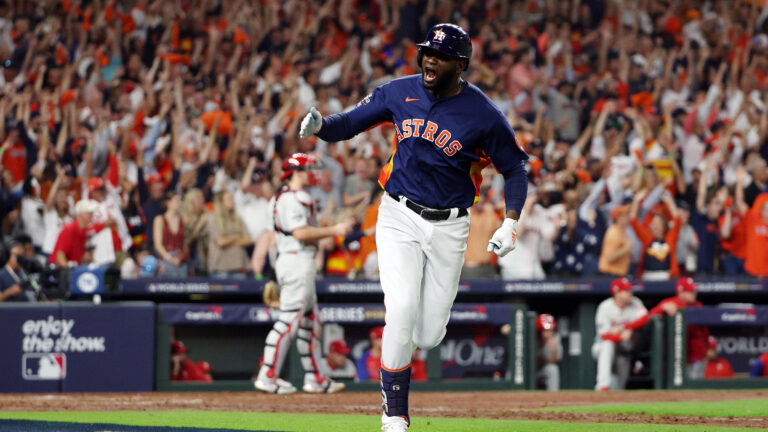 Yordan Alvarez of the Houston Astros hits a three-run home run against the Philadelphia Phillies during the sixth inning in Game Six of the 2022 World Series at Minute Maid Park.