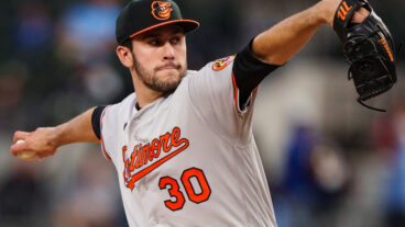 Grayson Rodriguez of the Baltimore Orioles throws a pitch during his Major League debut against the Texas Rangers at Globe Life Field.