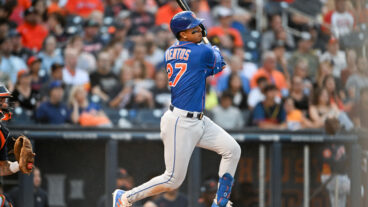 Mark Vientos of the New York Mets hits a double during the second inning of a spring training game against the Houston Astros at The Ballpark of the Palm Beaches.