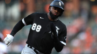 Luis Robert of the Chicago White Sox rounds the bases before scoring a run against the Baltimore Orioles during the first inning at Oriole Park at Camden Yards.