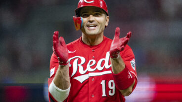 CINCINNATI, OHIO - AUGUST 19: Joey Votto #19 of the Cincinnati Reds smiles and claps during a game against the Toronto Blue Jays at Great American Ball Park