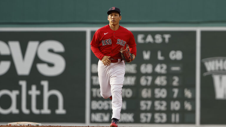 Masataka Yoshida of the Boston Red Sox runs in from left field against the Toronto Blue Jays during the ninth inning at Fenway Park.