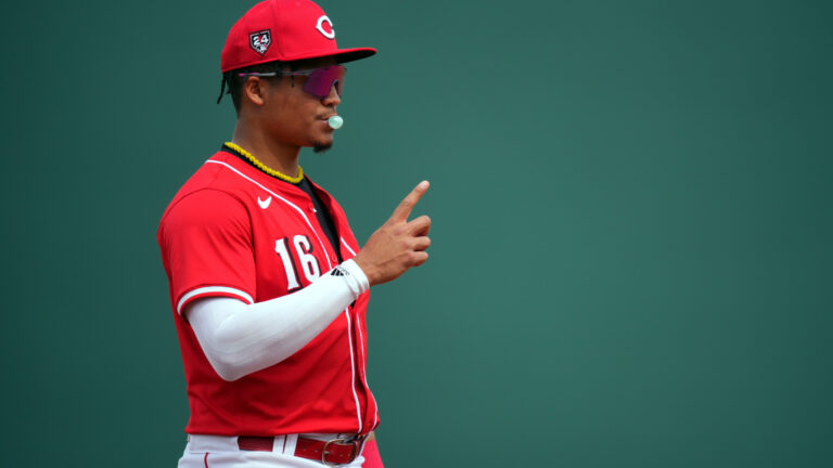 GOODYEAR, ARIZONA - MARCH 06: Noelvi Marte #16 of the Cincinnati Reds signals to teammates between batters in the second inning during a spring training game against the Milwaukee Brewers at Goodyear Ballpark on March 06, 2024 in Goodyear, Arizona. (Photo by Aaron Doster/Getty Images)