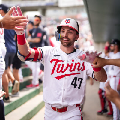 Edouard Julien of the Minnesota Twins celebrates during a spring training game against the Boston Red Sox at the Lee County Sports Complex.
