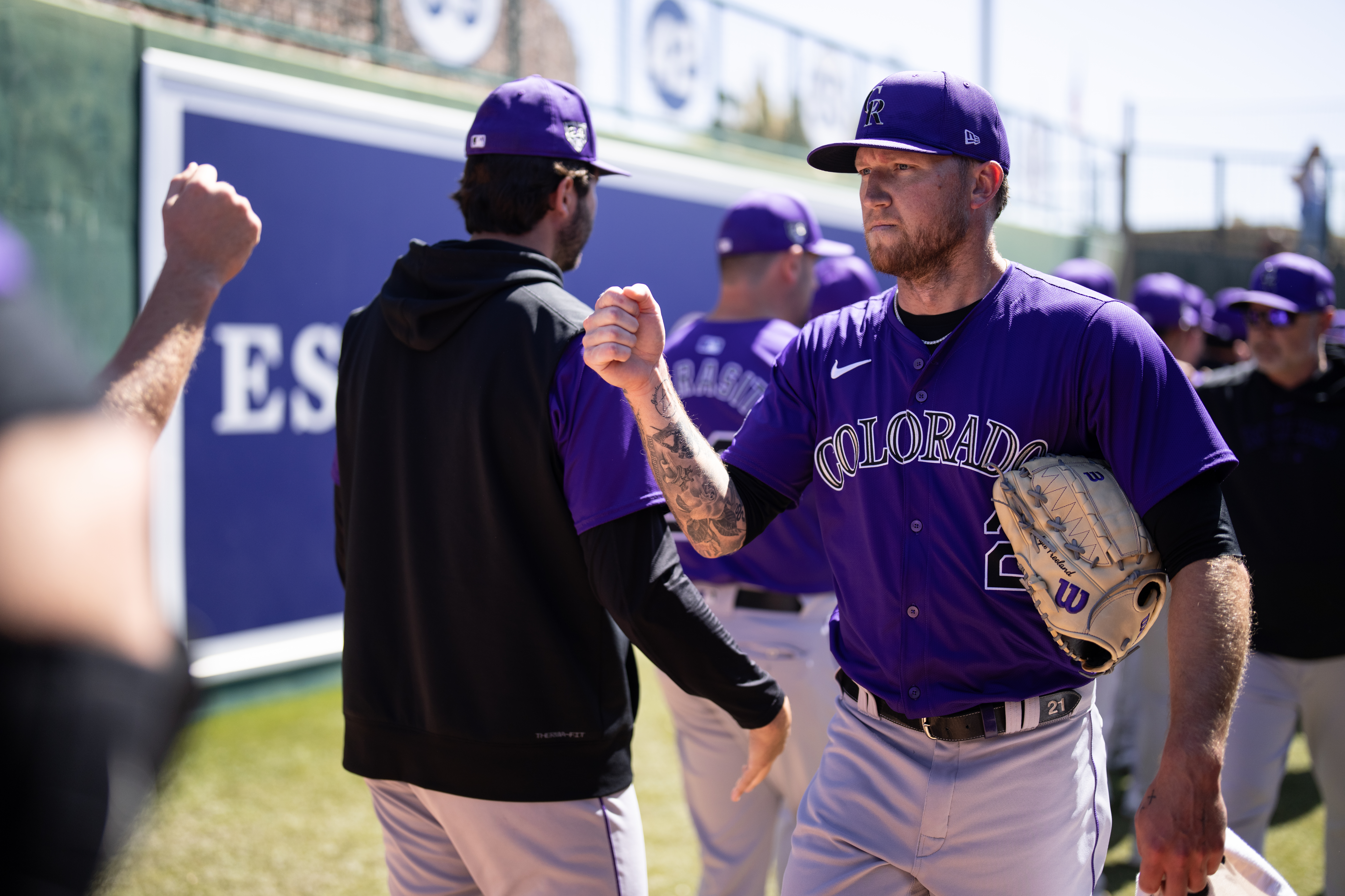 Kyle Freeland of the Colorado Rockies fist bumps teammates prior to a start against the White Sox at Camelback Ranch.