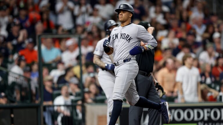 Juan Soto of the New York Yankees scores in the third inning against the Houston Astros at Minute Maid Park.