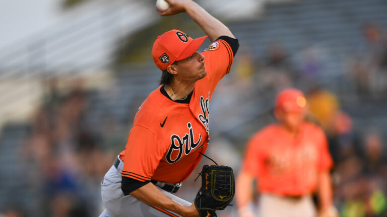 Cade Povich of the Baltimore Orioles throws a pitch during the first inning of a spring training Spring Breakout game against the Pittsburgh Pirates at LECOM Park.