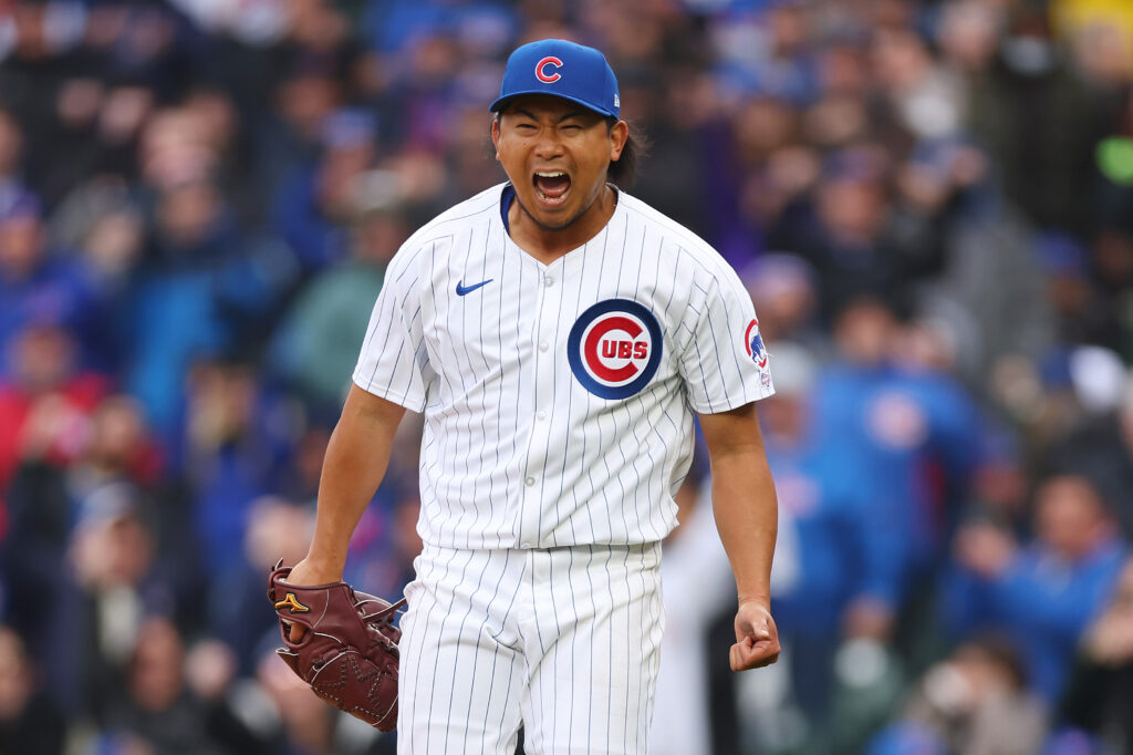 Shota Imanaga #18 of the Chicago Cubs celebrates after retiring the side in the sixth inning against the Colorado Rockies during his MLB debut at Wrigley Field.
