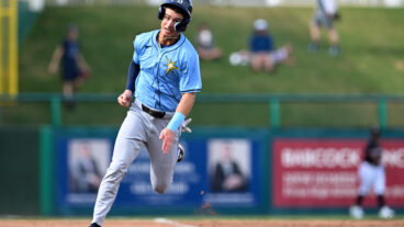 Carson Williams #80 of the Tampa Bay Rays rounds third base to score during the third inning of a spring training Spring Breakout game against the Minnesota Twins at Hammond Stadium.