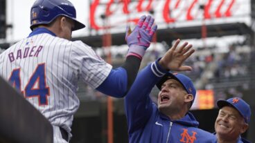Carlos Mendoza of the New York Mets congratulates Harrison Bader of the New York Mets on a two run home run against the Pittsburgh Pirates during the sixth inning at Citi Field.
