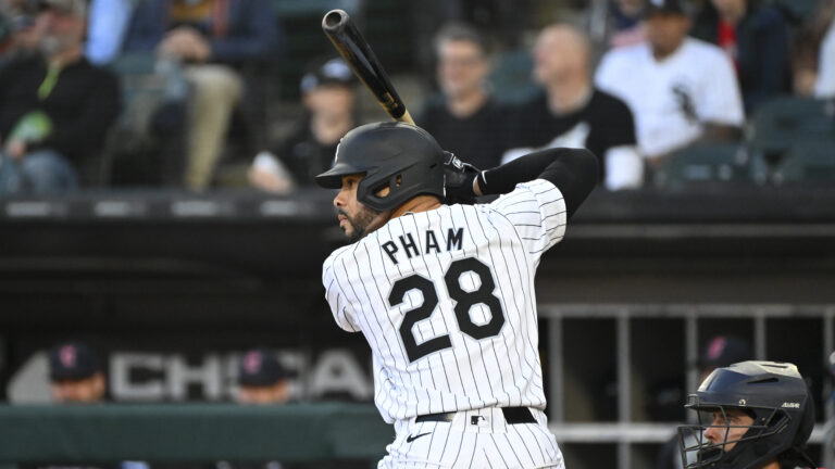 Tommy Pham #28 of the Chicago White Sox waits for a pitch during a game against the Cleveland Guardians at Guaranteed Rate Field.