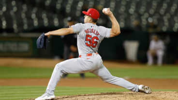 Ryan Helsley #56 of the St. Louis Cardinals pitches against the Oakland Athletics at Oakland Coliseum.