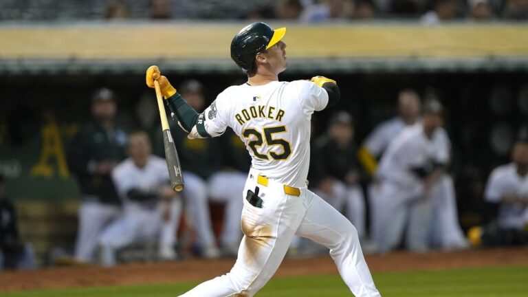 Brent Rooker of the Oakland Athletics bats against the Colorado Rockies in the bottom of the seventh inning at the Oakland Coliseum.