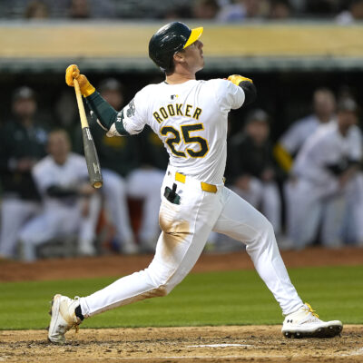 Brent Rooker of the Oakland Athletics bats against the Colorado Rockies in the bottom of the seventh inning at the Oakland Coliseum.