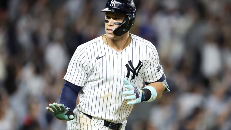 Aaron Judge #99 of the New York Yankees reacts after a solo home run against the Los Angeles Dodgers during the eighth inning at Yankee Stadium.