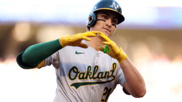 Tyler Soderstrom of the Oakland Athletics celebrates his two-run home run as he rounds the bases against the Minnesota Twins in the second inning at Target Field.