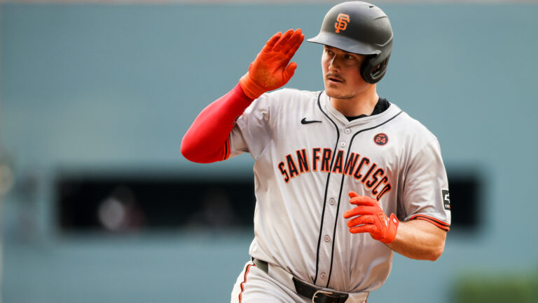 Matt Chapman #26 of the San Francisco Giants rounds the bases after hitting a go ahead solo home run during the fourth inning against the Atlanta Braves at Truist Park.