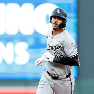 Miguel Vargas of the Chicago White Sox rounds the bases on his two-run home run against the Minnesota Twins in the third inning at Target Field.