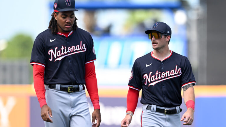 PORT ST. LUCIE, FLORIDA - MARCH 15, 2024: Dylan Crews #3 and James Wood #50 of the Washington Nationals warm up prior to a spring training Spring Breakout game against the New York Mets at Clover Park on March 15, 2024 in Port St. Lucie, Florida. (Photo by Nick Cammett/Diamond Images via Getty Images)