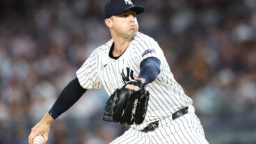 Clay Holmes #35 of the New York Yankees in action against the Cincinnati Reds at Yankee Stadium.