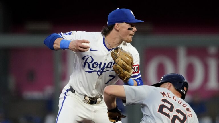 Bobby Witt Jr. of the Kansas City Royals steps on second for the out on Parker Meadows #22 of the Detroit Tigers on a fielder's choice in the third inning at Kauffman Stadium.