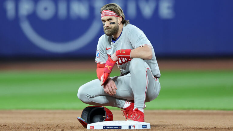 Bryce Harper of the Philadelphia Phillies looks on from second base in the sixth inning against the New York Mets during Game Four of the Division Series at Citi Field.