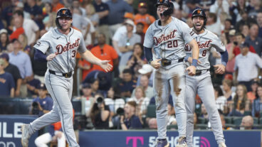HOUSTON, TX - OCTOBER 02: (left to right) Detroit Tigers second baseman Colt Keith (33), Detroit Tigers first baseman Spencer Torkelson (20) and Detroit Tigers right fielder Matt Vierling (8) cheer on Detroit Tigers third baseman Andy Ibáñez (77) (not pictured), cheer he gets on third base in the top of the eighth inning during the 2024 AL Wild Card Game between the Detroit Tigers and Houston Astros on October 2, 2024 at Minute Maid Park in Houston, Texas. (Photo by Leslie Plaza Johnson/Icon Sportswire via Getty Images)