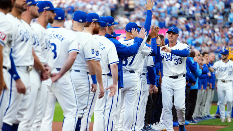 KANSAS CITY, MO - OCTOBER 09: Manager Matt Quatraro #33 of the Kansas City Royals is greeted by players during the pre-game ceremony prior to Game 3 of the Division Series presented by Booking.com between the New York Yankees and the Kansas City Royals at Kauffman Stadium on Wednesday, October 9, 2024 in Kansas City, Missouri. (Photo by Mary DeCicco/MLB Photos via Getty Images)