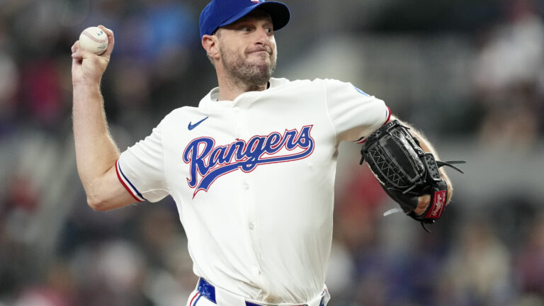 Max Scherzer of the Texas Rangers pitches during the first inning against the Chicago White Sox at Globe Life Field.