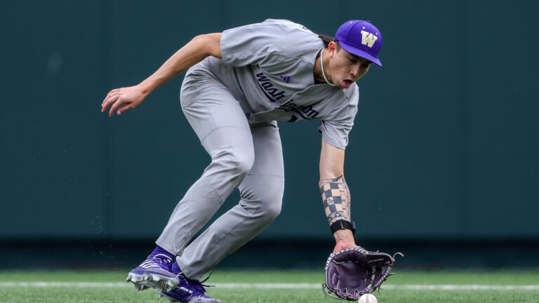 Washington infielder Aiva Arquette fields a ground ball during the college baseball game between Texas Longhorns and Washington Huskies.