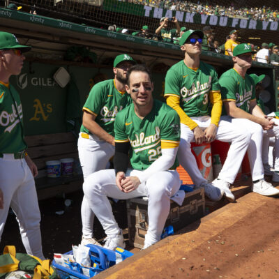 OAKLAND, CA - SEPTEMBER 26: Brent Rooker #25 of the Oakland A's in the dugout during the game against the Texas Rangers at the Oakland Coliseum on September 26, 2024 in Oakland, California. The Athletics defeated the Rangers 3-2 in the Athletics last game at the Oakland Coliseum. (Photo by Michael Zagaris/Oakland Athletics/Getty Images)