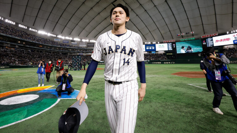 Roki Sasaki of Team Japan walks back to the locker room after their Game 6 of Pool B win over Team Czech Republic at Tokyo Dome.