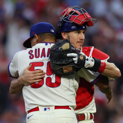 PHILADELPHIA, PA - SEPTEMBER 25: Pitcher Ranger Suarez #55 of the Philadelphia Phillies is congratulated by catcher J.T. Realmuto #10 after pitching a complete game shutout as the Phillies defeated the Pittsburgh Pirates 3-0 at Citizens Bank Park on September 25, 2021 in Philadelphia, Pennsylvania. (Photo by Rich Schultz/Getty Images)