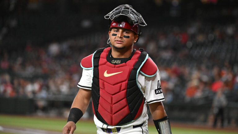 PHOENIX, ARIZONA - SEPTEMBER 25: Gabriel Moreno #14 of the Arizona Diamondbacks walks back to the dugout against the San Francisco Giants at Chase Field on September 25, 2024 in Phoenix, Arizona. (Photo by Norm Hall/Getty Images)