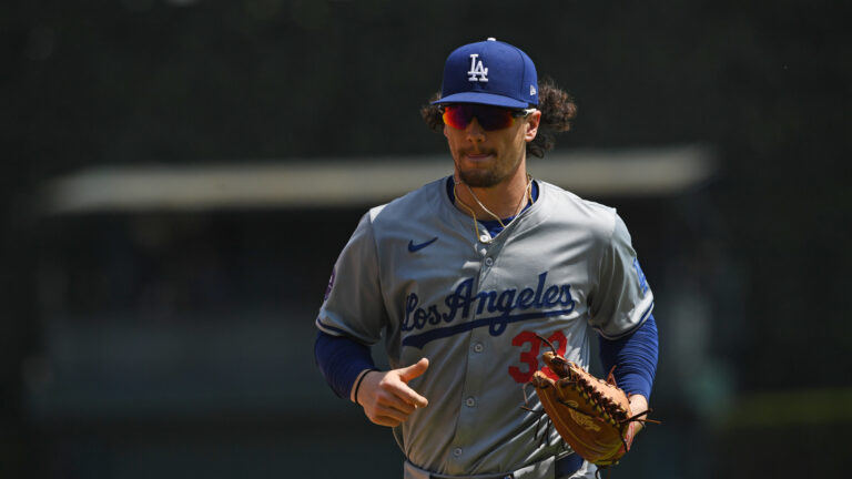 DETROIT, MICHIGAN - JULY 14, 2024: James Outman #33 of the Los Angeles Dodgers runs off the field after the fifth inning against the Detroit Tigers at Comerica Park on July 14, 2024 in Detroit, Michigan. (Photo by George Kubas/Diamond Images via Getty Images)