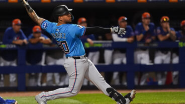 Agustin Ramirez of the Miami Marlins takes a swing in a spring training game.