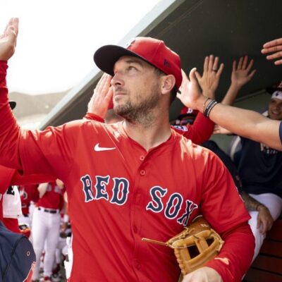 Alex Bregman of the Boston Red Sox reacts in the dugout before a Grapefruit League game against the Tampa Bay Rays at JetBlue Park at Fenway South.