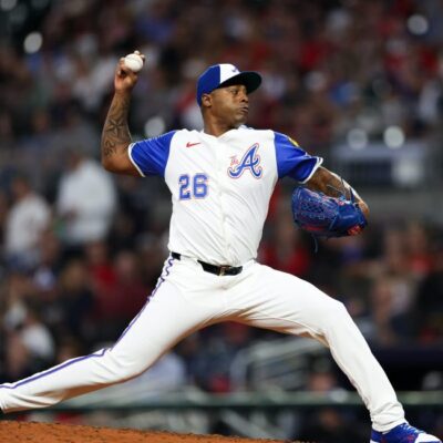 Raisel Iglesias of the Atlanta Braves delivers a pitch during the ninth inning against the Kansas City Royals at Truist Park.
