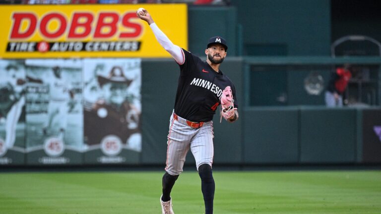 Carlos Correa of the Minnesota Twins throws to first base for an out against the St. Louis Cardinals in the fifth inning on Opening Day at Busch Stadium.