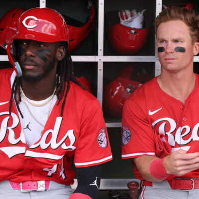 SURPRISE, ARIZONA - MARCH 12: Elly De La Cruz #44 and Matt McLain #9 of the Cincinnati Reds prepare to bat against the Texas Rangers during the first inning of the MLB game at Surprise Stadium on March 12, 2025 in Surprise, Arizona. (Photo by Christian Petersen/Getty Images)