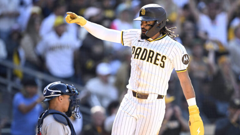Fernando Tatis Jr. of the San Diego Padres celebrates after scoring a run against the Atlanta Braves during the seventh inning on Opening Day at Petco Park.