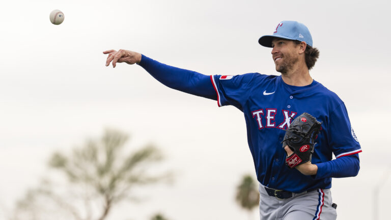 Jacob deGrom of the Texas Rangers throws during a spring training workout at Surprise Stadium.
