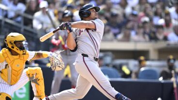 Drake Baldwin of the Atlanta Braves flies out during the fifth inning against the San Diego Padres on Opening Day at Petco Park.