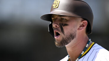 Jackson Merrill #3 of the San Diego Padres reacts after a single against the Atlanta Braves on Opening Day at Petco Park.