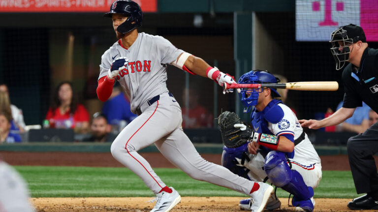 ARLINGTON, TEXAS - MARCH 27: Kristian Campbell #28 of the Boston Red Sox hits a single in the ninth against the Texas Rangers in an Opening Day game at Globe Life Field on March 27, 2025 in Arlington, Texas. (Photo by Richard Rodriguez/Getty Images)