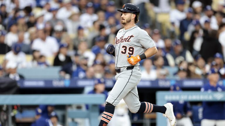 Zach McKinstry of the Detroit Tigers scores a run in the eighth inning against the Los Angeles Angels.