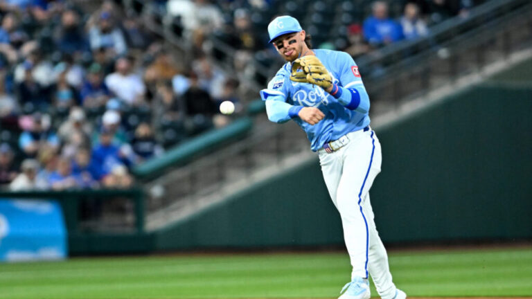 SURPRISE, ARIZONA - MARCH 05, 2025: Bobby Witt Jr. #7 of the Kansas City Royals throws to first base during the second inning of a spring training game against the Seattle Mariners at Surprise Stadium on March 05, 2025 in Surprise, Arizona. (Photo by David Durochik/Diamond Images via Getty Images)